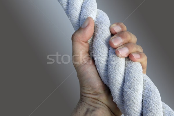 Férfi kéz markolás erős nagy kopott Stock fotó © lunamarina