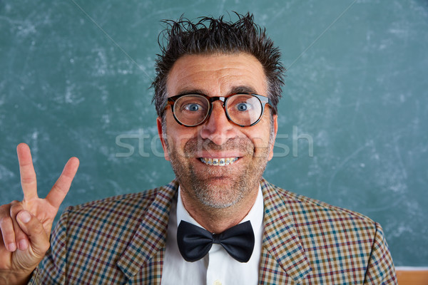 Stock photo: Nerd silly retro man with braces funny expression