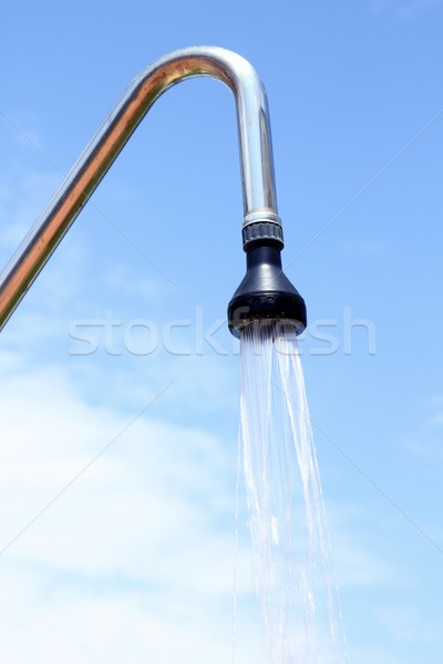 Doccia sprinkler cielo blu outdoor acqua cadere Foto d'archivio © lunamarina