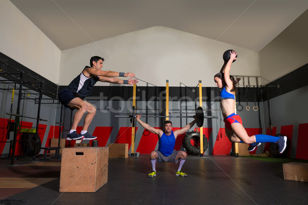 gym group workout barbells slam balls and jump Stock photo © lunamarina