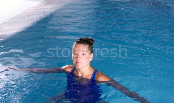 blue pool woman beautiful swimming in water Stock photo © lunamarina