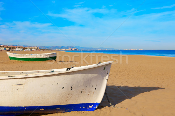 Valencia La Malvarrosa beach boats stranded Stock photo © lunamarina