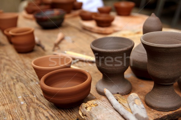 clay pottery potter handcrafts on vintage table Stock photo © lunamarina