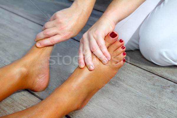 Reflexology woman feet massage therapy Stock photo © lunamarina