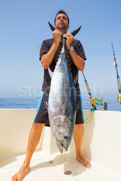 big Bluefin tuna catch by fisherman on boat trolling Stock photo © lunamarina