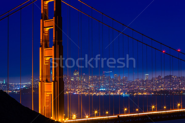Golden Gate Bridge San Francisco sunset through cables Stock photo © lunamarina