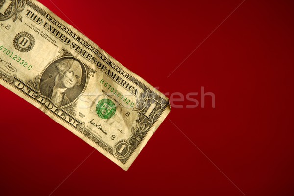 One dollar note over red background Stock photo © lunamarina