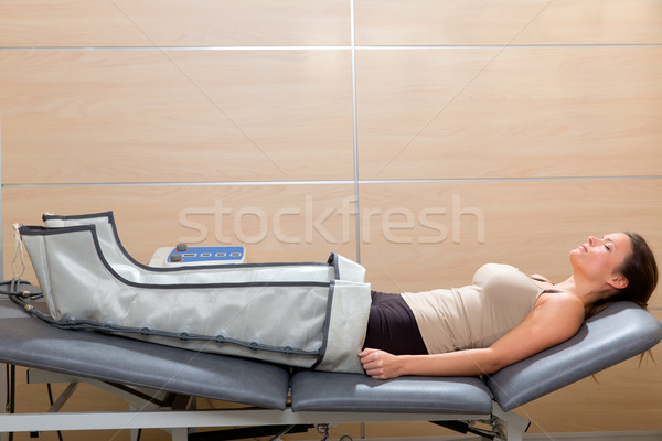 legs pressotherapy machine on woman patient in hospital Stock photo © lunamarina