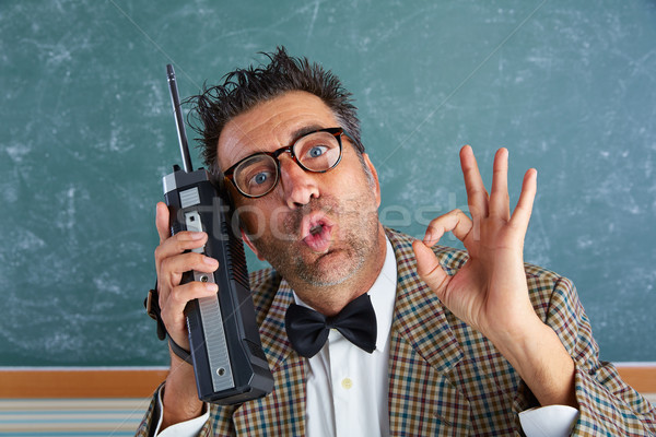 Nerd silly private investigator retro walkie talkie Stock photo © lunamarina