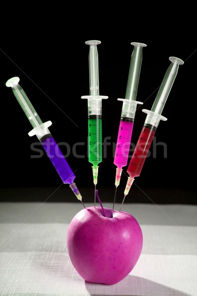apple manipulation with syringes Stock photo © lunamarina