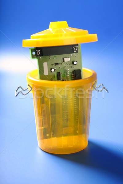 technology circuit on the trash Stock photo © lunamarina