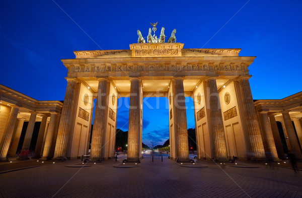 Berlin Brandenburgi kapu naplemente Németország épület fény Stock fotó © lunamarina
