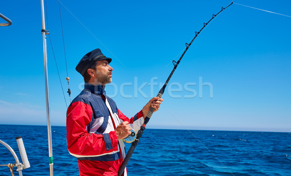 [[stock_photo]]: Barbe · marin · homme · canne · à · pêche · pêche · à · la · traîne