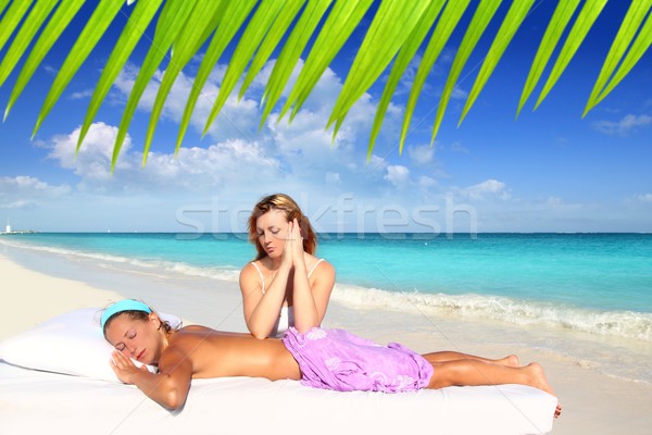 Strand massage meditatie druk caribbean vrouw Stockfoto © lunamarina