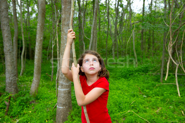 Happy girl playing in forest park jungle with liana Stock photo © lunamarina