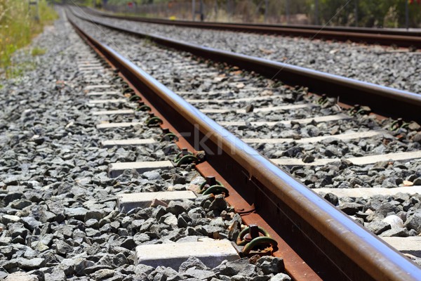 iron rusty train railway detail over dark stones Stock photo © lunamarina