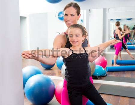 mirror pilates gym woman toning balls sport gym Stock photo © lunamarina
