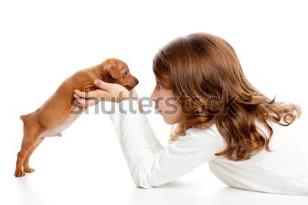 Brunette profile girl with dog puppy mini pinscher Stock photo © lunamarina