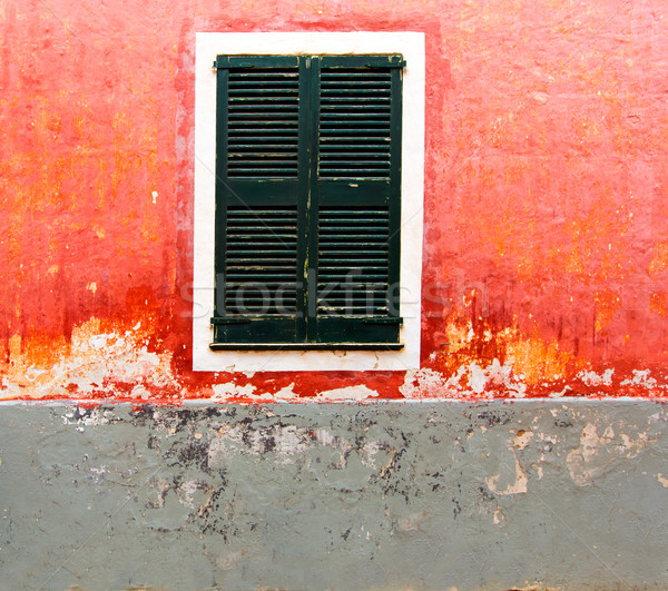 Menorca Ciutadella red grunge facade texture Stock photo © lunamarina