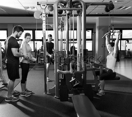 Toes to bar man pull-ups 2 bars workout Stock photo © lunamarina