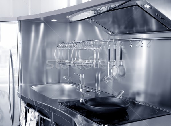 Kitchen silver sink and vitroceramic stove hob Stock photo © lunamarina