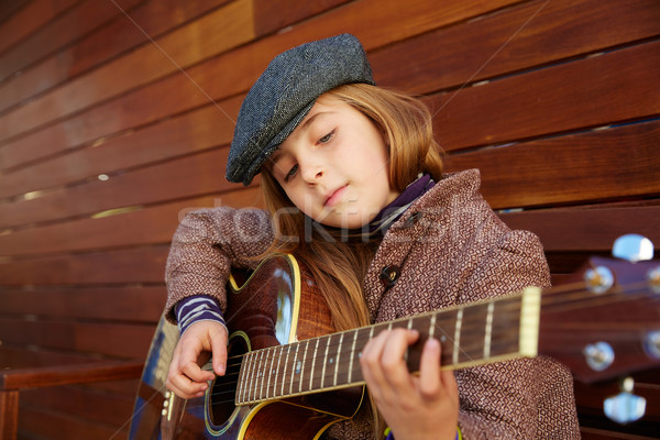 Blond Kid fille jouer guitare hiver [[stock_photo]] © lunamarina