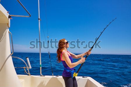 bikini fisher woman and daughter with bluefin tuna Stock photo © lunamarina