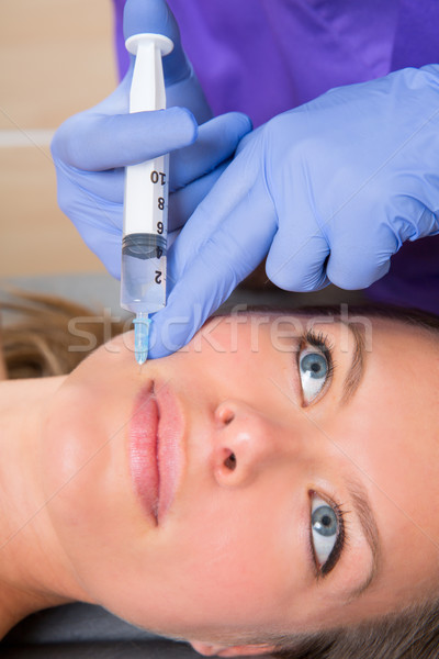 Envejecimiento jeringa rostro de mujer primer plano mujer cara Foto stock © lunamarina