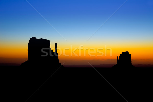 Stock photo: Sunrise at Monument Valley West and East Mittens Butte
