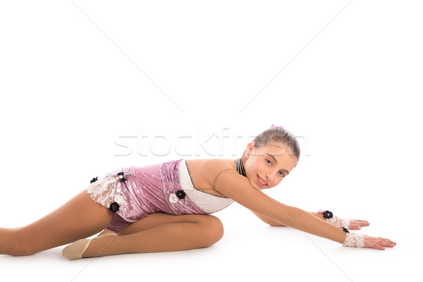 Kid girl rhythmic gymnastics exercises on white Stock photo © lunamarina