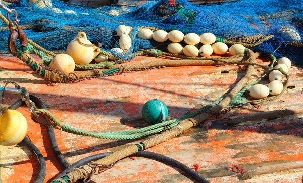 Fisherboat deck with net and tackle Stock photo © lunamarina