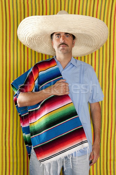 Mexican man serape poncho hat sombrero Stock photo © lunamarina