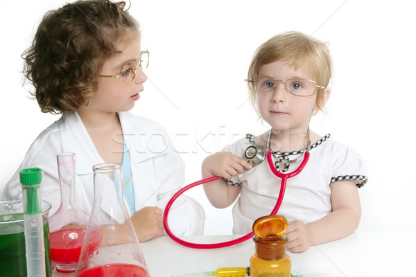 Girls pretending to be doctor in laboratory Stock photo © lunamarina