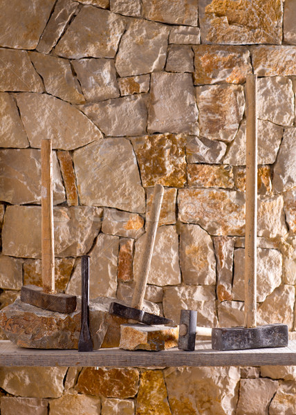 Hammer tools of stonecutter masonry work Stock photo © lunamarina