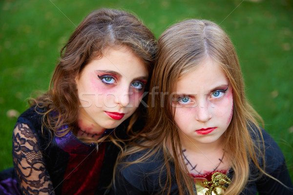 Halloween makeup kid girls blue eyes in outdoor lawn Stock photo © lunamarina