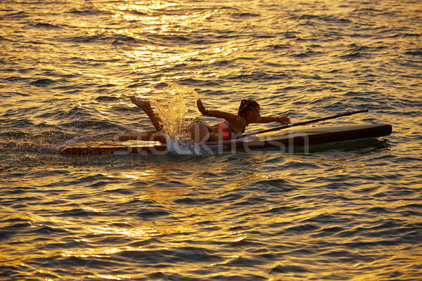 Stand up surf fille natation bord [[stock_photo]] © lunamarina