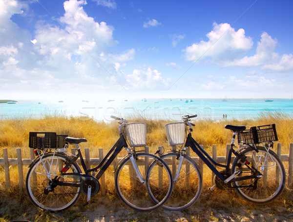 bicycles couple parked in Formentera beach Stock photo © lunamarina