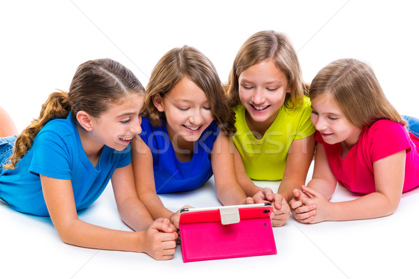 Stock photo: sisters kid girls with tech tablet pc playing happy