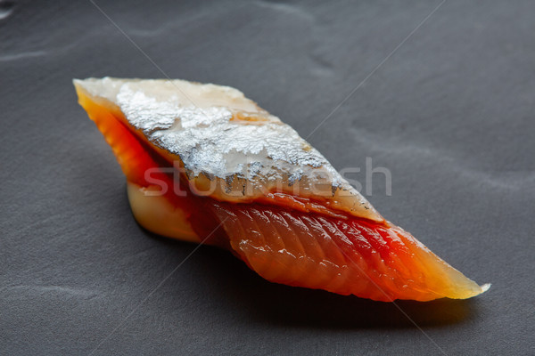 Stock photo: Bota sardine macro slice closeup on black