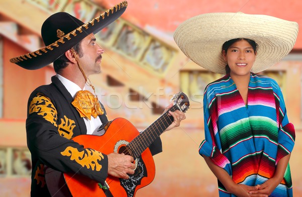 Mexican mariachi charro man and poncho Mexico girl Stock photo © lunamarina