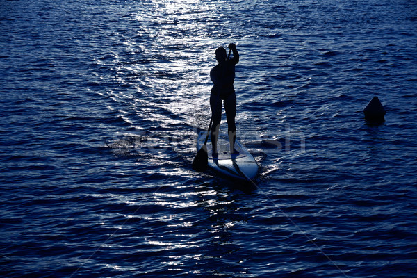 Stand up surf ragazza cielo acqua Foto d'archivio © lunamarina