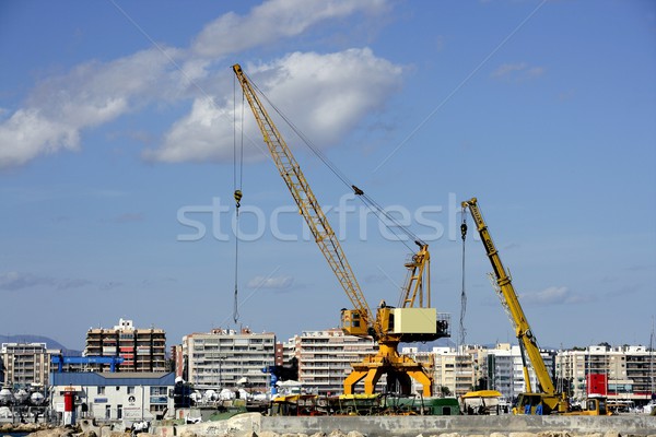 Kran Hafen Spanien gelb blauer Himmel Stock foto © lunamarina