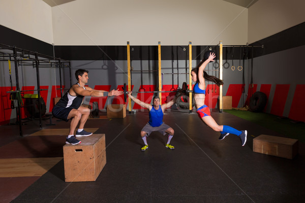 gym group workout barbells slam balls and jump Stock photo © lunamarina