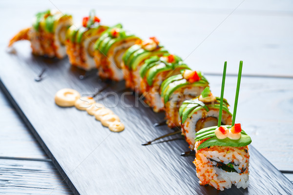 Dragon shape Sushi rice roll Stock photo © lunamarina