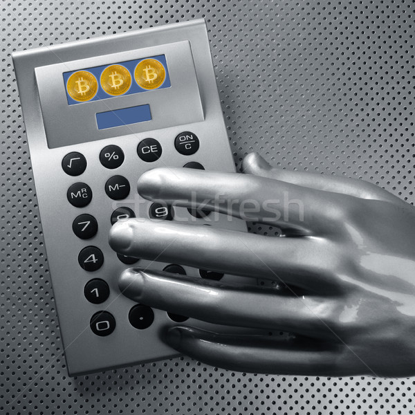 calculator with bitcoin btc coin and futuristic hand Stock photo © lunamarina