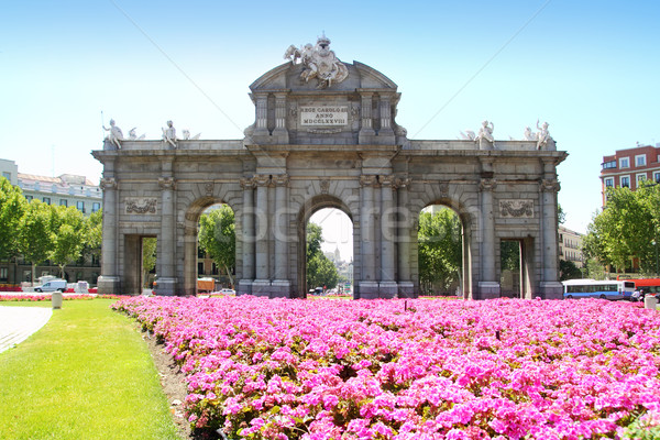 Madrid Puerta de Alcala with flower gardens Stock photo © lunamarina