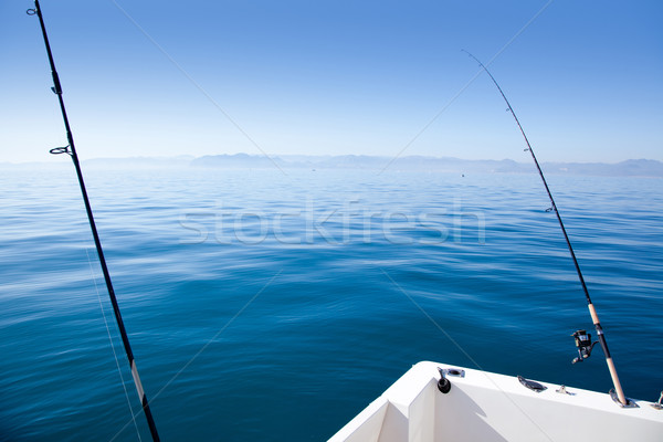 boat fishing rod in mediterranean blue sea Stock photo © lunamarina