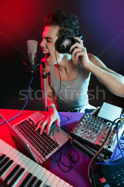 Színes fény zene felszerlés digitális férfi Stock fotó © lunamarina