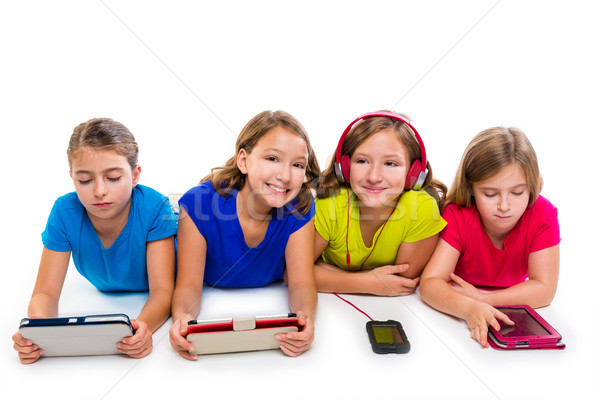 sisters kid girls tech tablets and smatphones Stock photo © lunamarina