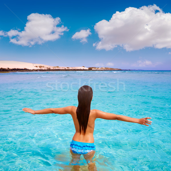 Lány tengerpart Kanári-szigetek Spanyolország égbolt víz Stock fotó © lunamarina
